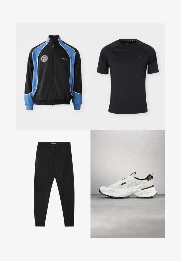 Veste de sport noire et bleue, devant zippé, avec un passepoil blanc contrastant, patch logo sur la poitrine, poignets côtelés, en tissu synthétique lisse.; T-shirt de sport noir à manches courtes avec col rond et petit logo sur la poitrine gauche, présenté sur un fond clair uni.; Pantalons de sport noirs en tissu texturé, dotés d'une taille réglable, d'une poche latérale zippée et de chevrons resserrés.; Baskets Calvin Klein blanches et noires avec côtés en mesh et semelle épaisse flottant au-dessus d'un sol gris près d'un mur en blocs de verre.