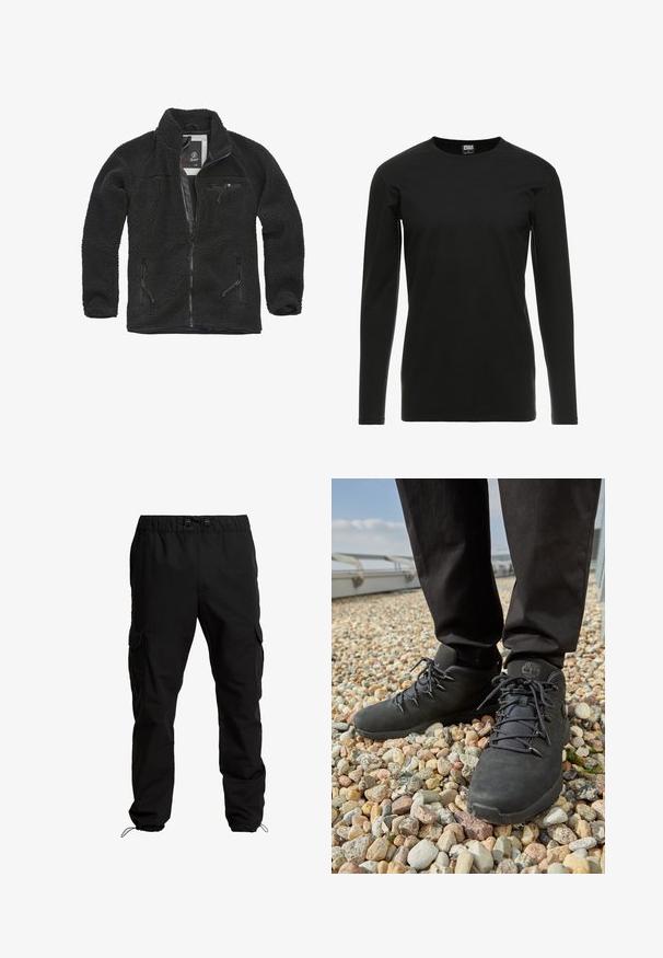 Schwarze Fleecejacke mit durchgehendem Reißverschluss und seitlichen Taschen. Texturierter Stoff, hoher Kragen und aufgesetzte Brusttasche mit Reißverschluss. Leichtes Design.; Urban Classics STRETCH TERRY - Langarmshirt - black; Schwarze Cargo-Hosen aus strapazierfähigem Stoff, mit elastischem Bund, verstellbaren Kordeln und Seitentaschen mit Klappen.; Schwarze Wanderschuhe aus strukturiertem Leder, mit robusten Schnürsenkeln und einem gepolsterten Knöchelkragen, getragen mit dunklen Hosen auf einem kieseligen Untergrund.