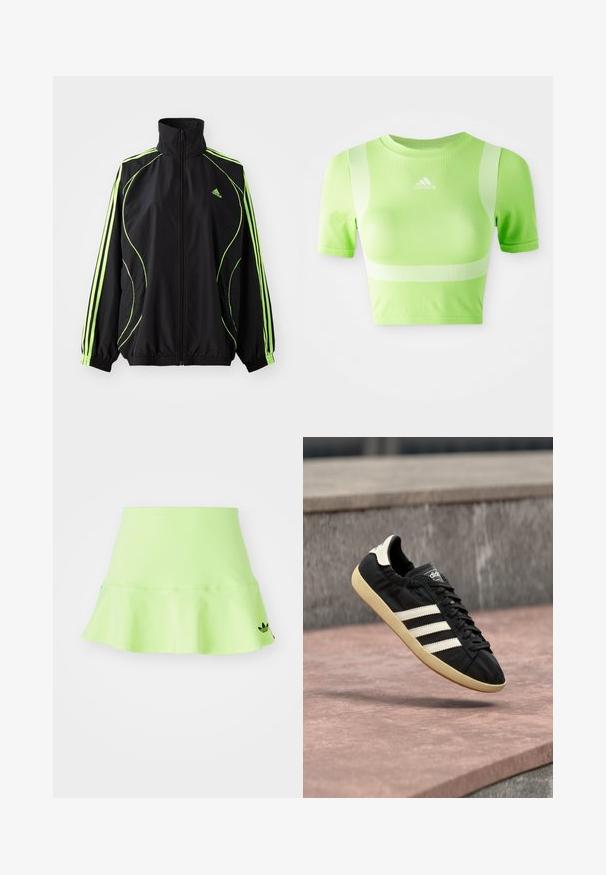 adidas Originals TEAMGEIST ADICOLOR - Übergangsjacke - black/signal green; Kurzes sportliches Shirt aus leuchtend grünem Stoff. Mit kurzen Ärmeln, Rundhalsausschnitt und weißem diagonalen Streifenmuster auf den Schultern. adidas-Logo auf der Vorderseite.; adidas Originals SKIRT - Minirock - signal green; Schwarzer Adidas-Sneaker mit weißen Streifen und beiger Sohle, in der Luft über einer steinernen Oberfläche und mit Steinwand im Hintergrund aufgenommen.