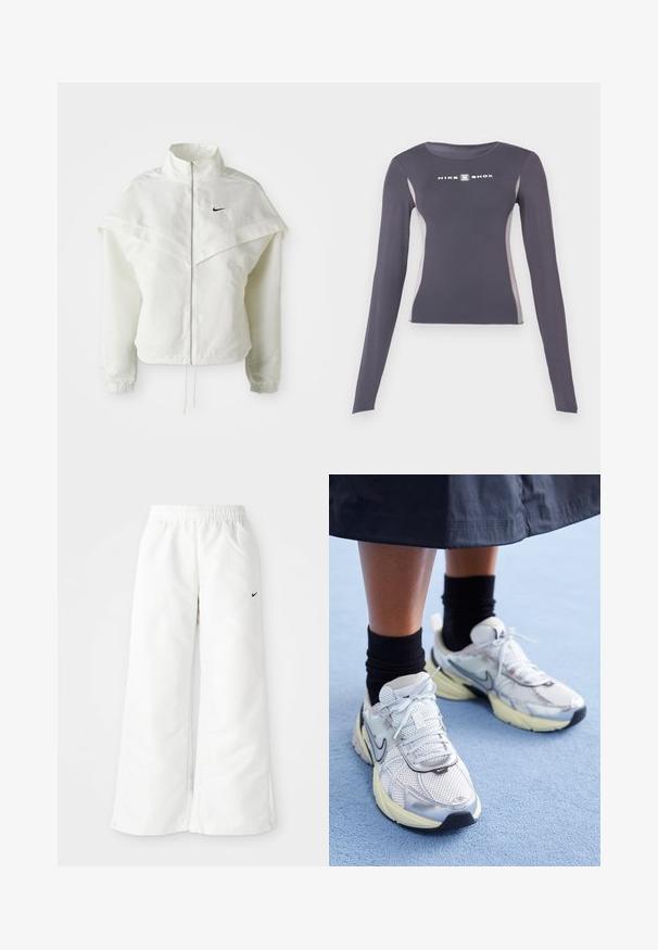 Hvid langærmet zip-up jakke med høj krave, kappe-lignende detaljer over skuldrene, elastiske manchetter og lille sort Nike-logo på brystet.; Mørkegrå langærmet tætsiddende atletiktrøje med lysegrå sidepaneler og hvidt "Nike Shox" logo på brystet.; Hvide atletiske bukser med et bredbenet design, elastisk talje og et lille sort Nike-logo på venstre side. Glat, let materiale.; Hvide og sølv Nike sneakers med mesh-stof, reflekterende detaljer og en beige sål. Bæres med sorte sokker og står på en blå overflade.