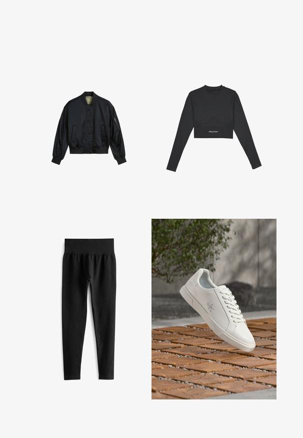 Zwarte bomberjack gemaakt van glad nylon. Beschikt over een hoge kraag, ribgebreide manchetten en zoom, twee voorzakken en een ritszak op de mouw.; Zwarte crop top met lange mouwen, ribbeltextuur, gaasaccenten aan de zijkanten en het woord "PEGADOR" gedrukt op de onderrand.; Zwarte geribde legging met een brede, elastische tailleband. De stof lijkt rekbaar en gestructureerd, eindigend net boven de enkel.; Witte lage sneaker met veters en Calvin Klein-logo aan de zijkant, zwevend boven een betegeld houten oppervlak buiten in de buurt van groen.