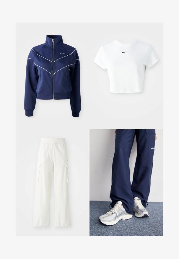Marine blauwe ritsjack, gemaakt van gladde stof, met een hoge kraag, witte chevron-stiksels en zijzakken. Nike-logo op de borst.; Witte cropped T-shirt van katoen, met korte mouwen en een ronde halslijn, voorzien van een zwart Nike-logo op de borst.; Witte cargobroek met een wijde pijpdesign, voorzien van een elastische tailleband en zijzakken. Gelaagd materiaal met een gladde afwerking.; Nike hardloopschoenen met een zilveren mesh bovenkant, witte accenten en structuurzolen, gecombineerd met luchtige navy broeken.