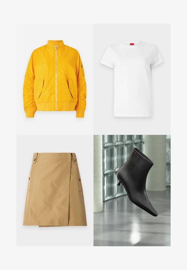 Veste bomber jaune avec une fermeture éclair à l'avant, col et poignets côtelés, deux poches latérales et une poche zippée sur la manche. Tissu lisse et brillant.; T-shirt blanc à manches courtes en coton léger. Présente un col rond et des manches retroussées. Étiquette logo rouge sur le col.; Jupe beige en tissu lisse avec un revêtement avant, dotée de deux poches latérales et de deux boutons à la taille.; Bottine en cuir noir avec bout pointu et petit talon, présentée devant un mur en blocs de verre et un sol poli.