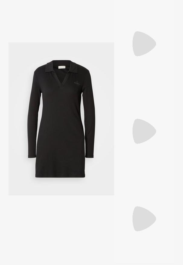 Zwarte lange mouwen polo jurk met een V-hals, geribbelde textuur en een subtiel logo detail op de linkerborst. Zachte katoenmix.; Zwarte leren cowboylaarzen met een spitse neus en een dikke hak, met een gladde afwerking en een strak ontwerp, gecombineerd met een grijze rok.; Zwarte leren handtas met twee lange banden en een klein gouden CK-logo middenvoor, rechthoekige vorm met licht naar buiten lopende zijnaden.; Calvin Klein SPIRAL - Armband - silver-coloured