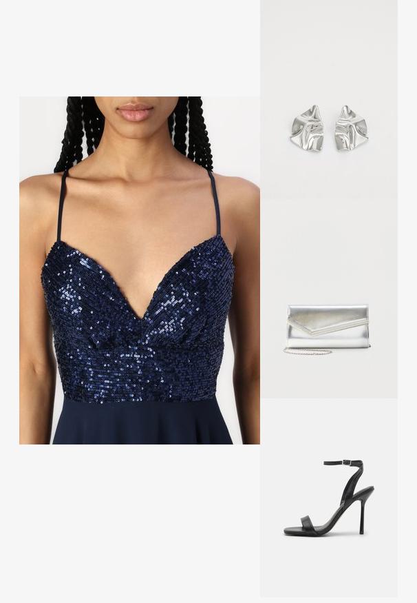 Robe bleu marine avec un décolleté en V, ornée de sequins sur le corps et de fines bretelles. La jupe s'évase doucement depuis la taille.; Sandale à talons hauts noire avec une fine sangle au niveau de la cheville et deux bandes à l'avant. Fabriquée en cuir lisse avec un bout pointu élégant et un talon aiguille.; Pochette argentée brillante avec rabat style enveloppe et garniture décorative, petite bandoulière chaîne argentée, sur fond clair uni.; Boucles d'oreilles en métal argenté avec un design ondulé et sculptural, présentant une finition polie et des formes irrégulières, mettant en valeur une esthétique contemporaine.