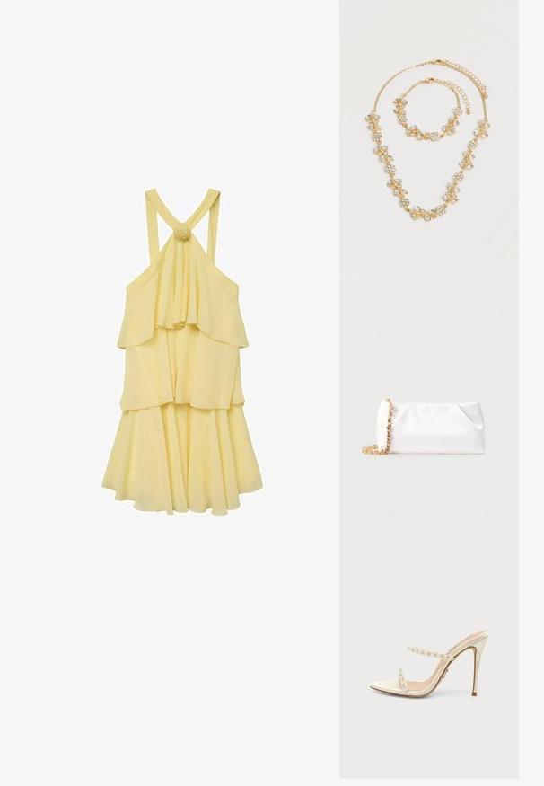 Vestido amarillo de capas con un diseño fluido, que presenta tirantes finos y una parte trasera fruncida. Acentuado con un detalle de flor en los tirantes.; Zueco beige de tacón alto con dos tiras finas decoradas con pequeñas piedras de imitación claras sobre un fondo blanco liso.; Bolso de mano suave blanco con correa de cadena dorada adornada con piedras preciosas transparentes, sobre un fondo liso de color gris claro.; Juego de collar y pulsera en tono dorado con diseños florales y de hojas de cristal claro, ambos con cierres de cadena ajustables sobre un fondo blanco.