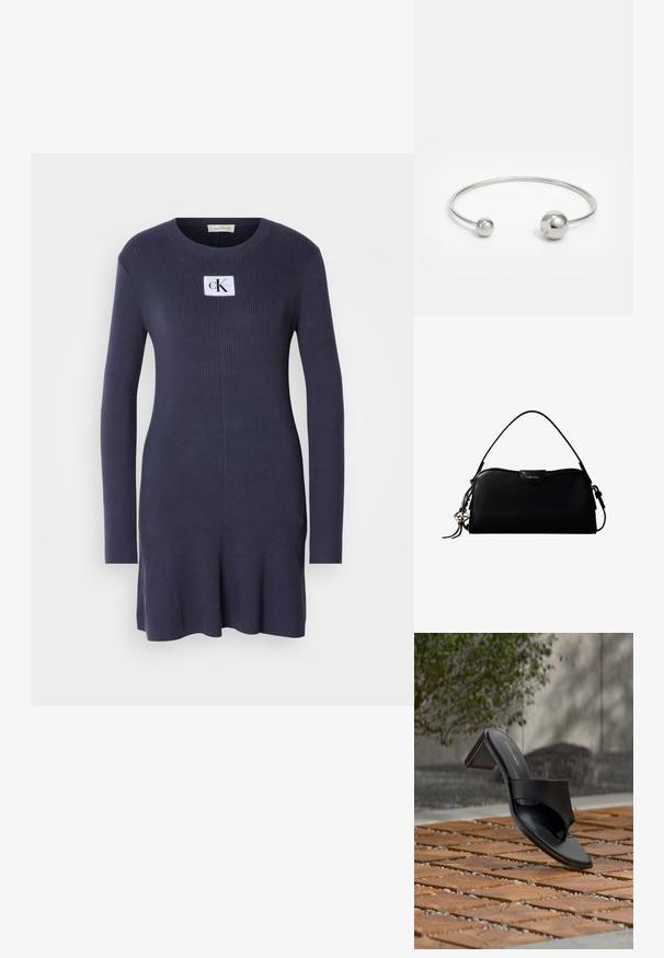 Marineblauw ribgebreid jurkje met lange mouwen en een uitlopende zoom. Heeft een witte patch met het logo "CK" op de borst. Zachte textuur.; Zwarte Calvin Klein sandaal met hak en teenlus op een houten tegelvloer buiten, nabij een boom en een stenen muur.; Zwarte rechthoekige Calvin Klein handtas met enkele bovenriem, zilveren logo-ornament en een kleine klepsluiting aan de voorkant.; Zilveren metalen bangle armband met twee bolvormige accenten aan beide uiteinden, een gladde oppervlakte, open ontwerp en een strak, minimalistisch model.