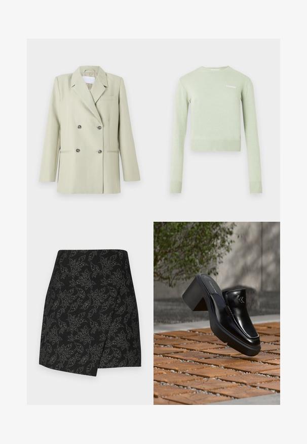 Dobbeltknappet blazer i lys grøn stof. Har notched revers, en brystlomme og to forlommer med mørke knapper.; Lysegrøn pullovertrøje med ribbet halsudskæring og manchetter. Kort, tætsiddende design med lille hvidt logo på brystet.; Sort nederdel med et omslagdesign, der har et bladmønster i sølvtoner. Glat tekstur med en asymmetrisk kant, der går til midten af låret.; Sort læder Calvin Klein slip-on mule med blokhæl, der hviler på trætøj udendørs nær en grøn plante og en grå væg.