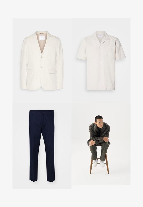 Hellbeige Leinenblazer mit einem einzelnen Knopfverschluss, Reverskragen, zwei Fronttaschen und taillierter Passform. Weiche Textur mit minimalistischem Design.; Kurzärmliges, hellbeiges Hemd aus strukturiertem Stoff mit einem eingeschnittenen Kragen und zwei Brusttaschen, das einen Knopfverschluss aufweist.; Dunkelblaue Hose aus glattem Stoff, mit geraden Beinen, einem Knopfverschluss und frontalen Taschen.; Junger Mann in dunkler Lederjacke und Jeans sitzt auf einem Holzstuhl, lehnt sich mit verschränkten Armen nach vorne und schaut seitlich vor weißem Hintergrund.