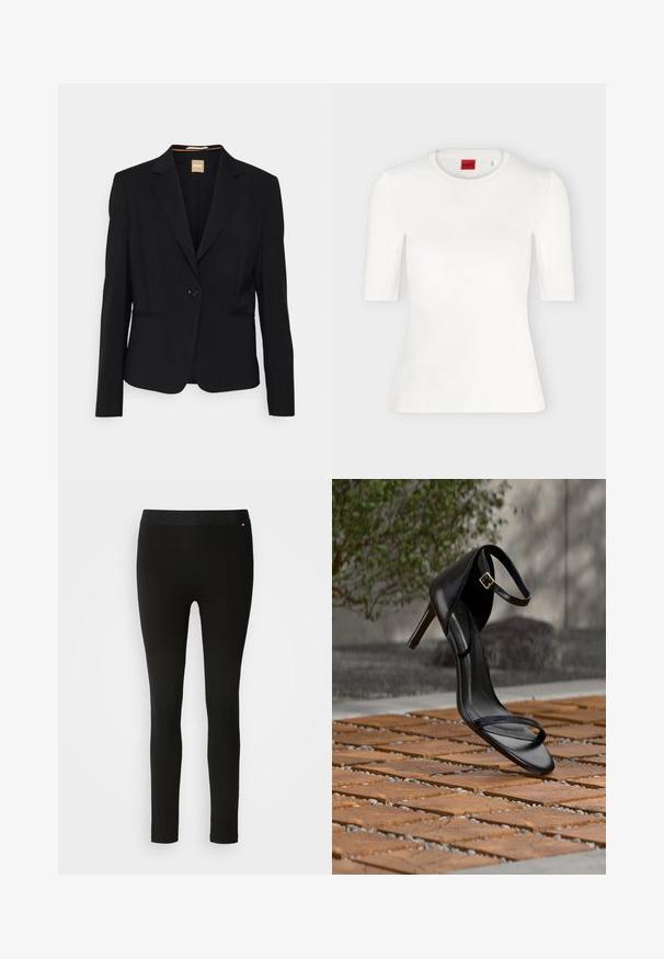 Blazer noir en tissu lisse, avec une fermeture à un bouton, des revers à cran et deux poches avant. Coupe ajustée avec des manches longues.; T-shirt blanc ajusté à manches courtes avec col rond et étiquette de marque rouge à l'intérieur du col.; Leggings noirs avec une texture lisse, présentant une taille flexible et des détails de couture subtils. Aucun motif ni élément métallique présent.; Sandale noire à talon haut avec sangle à la cheville, suspendue au-dessus d'un sol en carreaux de bois à l'extérieur, avec un arrière-plan flou de verdure et de pierre.