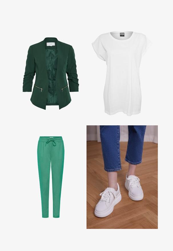 Groene op maat gemaakte blazer met een gladde textuur, open voorkant en twee met rits afgesloten zakken. Heeft gerimpelde mouwen en een satijnen voering.; Witte kortomoto T-shirt van katoen, met een ontspannen pasvorm, wijde halslijn en een minimalistisch ontwerp zonder patronen of accenten.; Groene joggerbroeken van zachte stof, met een elastische taille, trekkoordsluiting en twee zijzakken met een slim fit ontwerp.; Benen met cropped blauwe jeans en witte vetersneakers met plateauzool, staand op een lichte houten vloer.