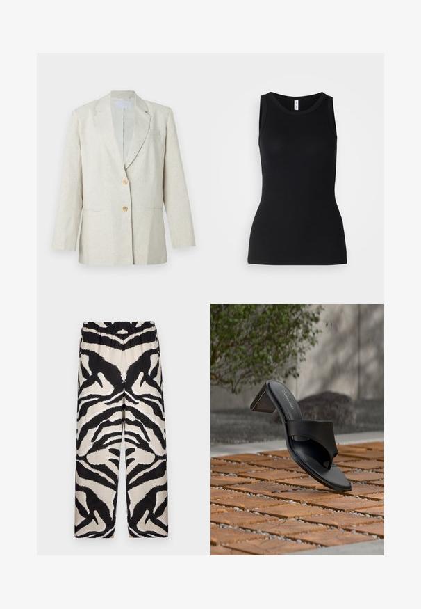 Blazer beige clair en tissu texturé, doté d'une fermeture à un bouton, de revers crantés et de deux poches avant. Silhouette ajustée.; Débardeur noir sans manches en tissu côtelé, avec un col rond et une coupe ajustée, à la texture douce et sans motifs.; Pantalons à jambes larges à motifs noir et beige, avec une taille élastique, mettant en valeur un audacieux motif de rayures zèbre dans un tissu lisse.; Sandale à talon noire Calvin Klein avec boucle pour l’orteil, posée sur un sol en carreaux de bois en extérieur, près d’un arbre et d’un mur en pierre.