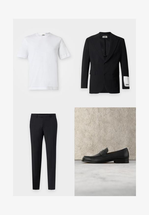 Blazer noir en tissu lisse, avec un col cranté, deux boutons et des poches latérales. Étiquette blanche notable sur la manche avec l'inscription "DRYKORN."; T-shirt en coton blanc à manches courtes, col rond et texture lisse. Aucun motif ni accent visible.; Pantalons noirs ajustés avec une coupe slim, présentant un devant plat, des passants de ceinture et aucune motif ou accent visible. Texture lisse.; Mocassin en cuir noir flottant au-dessus d'un tapis beige avec une table ronde brune brillante en arrière-plan.