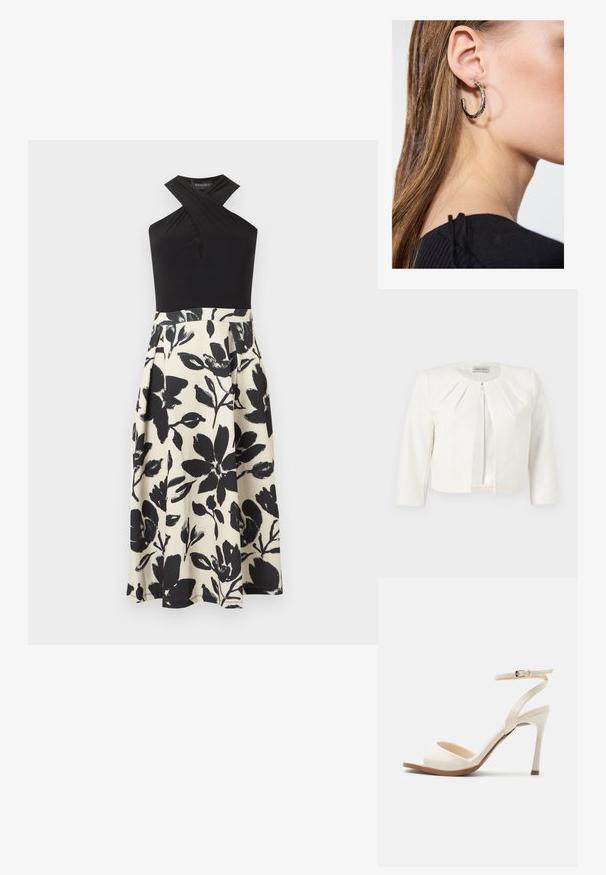 Blazer blanc court à manches trois-quarts avec des détails plissés autour du col, par Anna Field.; Haut noir sans manches à col licou avec un détail croisé, associé à une jupe taille haute blanche ornée de grandes impressions florales noires.; Sandale à talon haut beige avec fine bride de cheville et boucle dorée, bout ouvert et talon aiguille élégant sur fond blanc.; Boucle d'oreille en argent avec une finition polie, présentant de petits détails en or et de forme ronde, portée sur le lobe.