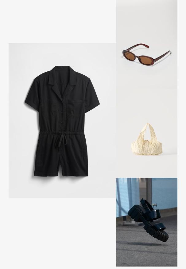 Zwarte jumpsuit met korte mouwen van lichtgewicht stof, voorzien van een kraag, knopen aan de voorkant, twee borstzakken en een verstelbare taille met trekkoord.; Zwarte chunky platform sandaal met twee banden en gesp, zwevend in de lucht boven grijze bestrating en een blauwe stoffen achtergrond.; Ronde, bruin getinte zonnebril met een glanzend bordeauxrood frame. Slanke pootjes met subtiele merkdetails. Vlakke lensontwerp.; Handtas van crèmekleurige gestructureerde stof met bovenhandvatten en een klein geknoopt strikje middenvoor.