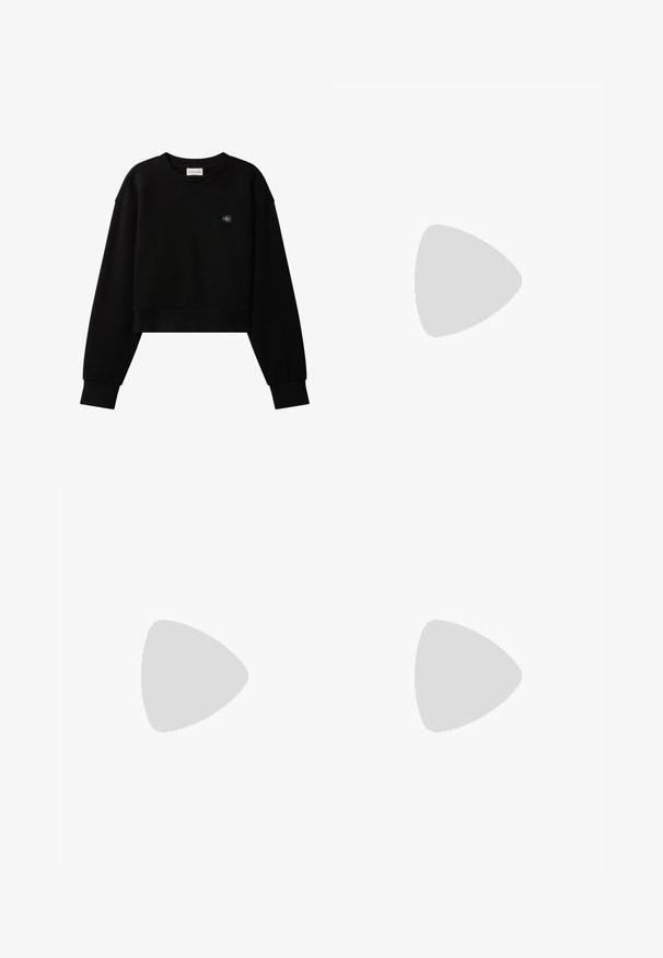 Čierna crop mikina s dlhými rukávmi, okrúhlym výstrihom a malou nášivkou s logom Calvin Klein na ľavej strane hrudníka.; Ostrihnuté čierne tričko s bielym obšitím výstrihu a rukávov. Na tričku je vytlačené "Calvin Klein" a "endless city" v bielej farbe. Vyrobené z jemnej bavlny.; Čierne rozšírené džínsy s priliehajúcim pásom, vyrobené z mäkkého denimu. Majú dve predné vrecká a klasické zapínanie na gombík a zips.; Čierne kordúrové tenisky s bielou gumovou podrážkou. Majú okrúhlu špičku, šnurovanie vpredu a minimalizované logo na boku.