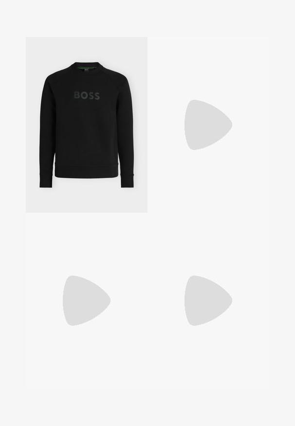 Sweatshirt noir à col rond, manches longues, avec le mot BOSS embossé en grandes lettres sur la poitrine. Aucun motif ou graphique visible.; Chemise blanche à manches longues avec col, logo noir "BOSS" sur le côté gauche de la poitrine, et poignets à boutons, présentée sur un fond uni.; Pantalon beige à jambes droites avec plis, fermeture par bouton, passants pour ceinture et coupe ajustée.; Mocassin en cuir noir flottant au-dessus d'un tapis beige avec une table ronde brune brillante en arrière-plan.