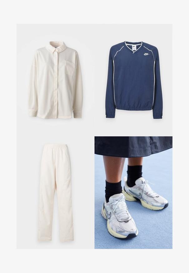 Mørkeblå Nike pullover med lange ærmer og V-hals, hvide striber langs sømmene samt elastiske manchetter og kant. Indeholder et logo på venstre side af brystet.; Hvid skjorte med krave, knaplukning og lodrette striber, lange ærmer, enkelt brystlomme, lavet af glat stof med en blød tekstur.; Løse, cremefarvede bukser med elastisk talje og lige ben, vist mod en ensfarvet hvid baggrund.; Hvide og sølv Nike sneakers med mesh-stof, reflekterende detaljer og en beige sål. Bæres med sorte sokker og står på en blå overflade.
