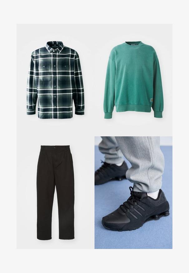 Sweatshirt vert à col rond fabriqué en mélange de coton. Il présente des poignets et un ourlet côtelés, une coupe décontractée, et une petite étiquette logo sur le bas à gauche.; Chemise à manches longues à carreaux bleu marine et vert, avec un front entièrement boutonné, deux poches poitrine et un col classique.; Pantalons noirs en tissu lisse, dotés d'une fermeture à bouton, d'une coupe droite et de deux plis à l'avant pour un détail supplémentaire.; Personne portant des baskets Nike Shox noires et un pantalon de survêtement gris, debout sur un tapis bleu clair.