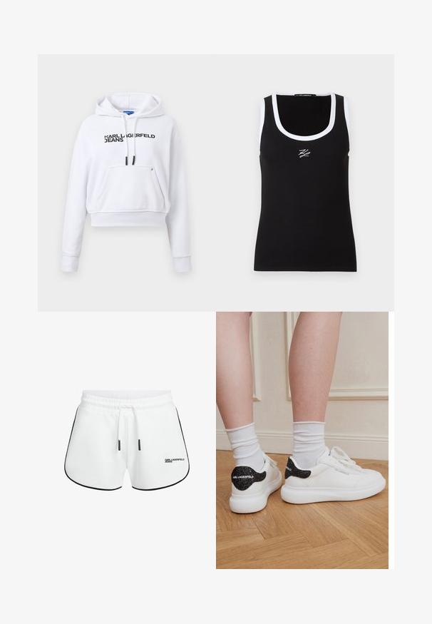 Hoodie blanc court avec poche avant, cordons noirs et logo "KARL LAGERFELD JEANS" sur la poitrine.; Débardeur noir à côtes avec un bord blanc et un col arrondi. Présente un petit logo brodé blanc à l'avant.; Shorts blancs en tissu doux, avec un galon noir le long des côtés, une taille élastique et un cordon de serrage à l'avant. Logo affiché sur la hanche.; Jambes portant des chaussettes blanches et des baskets blanches Karl Lagerfeld avec des accents pailletés noirs au talon, debout sur un parquet en bois.