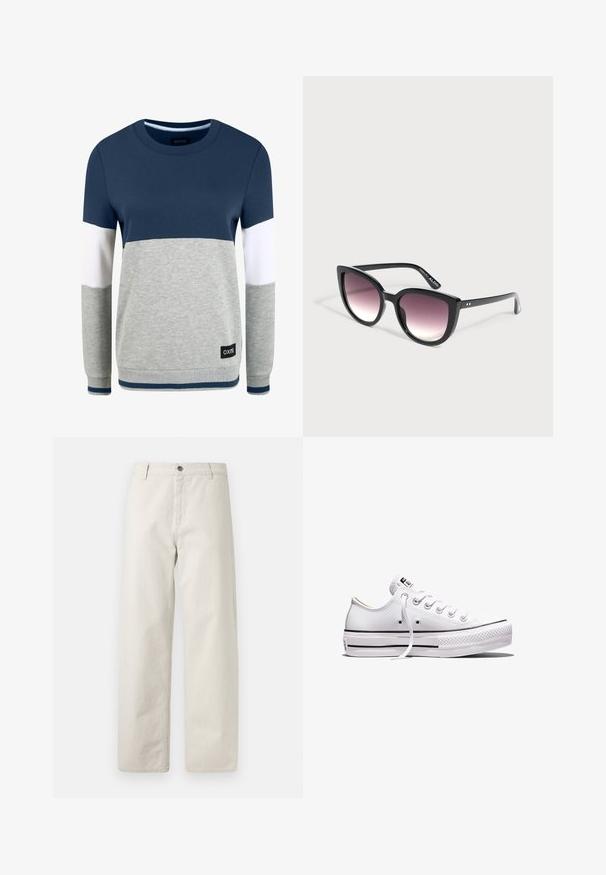 Oxmo OMAYA - Sweater - insignia blue; Beige broek met wijde pijpen, subtiele verticale krijtstrepen, riemlussen, knoopsluiting en voorzakken.; Wit lage canvas sneaker met witte veters, rubberen zool, zwarte streepdetails en logopatch op de tong en hiel.; Zwarte cat-eye zonnebril met paarse verloopgetinte glazen, liggend op een lichtgrijze ondergrond.