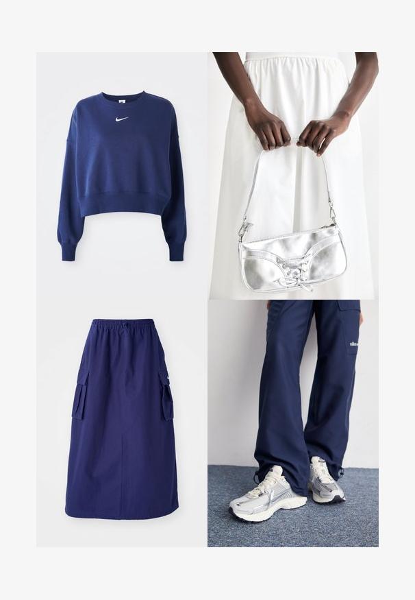 Sudadera corta azul marino hecha de un tejido suave, con cuello redondo, mangas largas y un logo blanco de Nike en el pecho.; Falda azul marino de longitud media con una cinturilla elástica, que presenta dos bolsillos laterales tipo cargo y un detalle de logotipo minimalista. Textura de tela suave.; Zapatillas deportivas Nike con parte superior de malla plateada, acentos blancos y suelas texturizadas, combinadas con pantalones azul marino de corte holgado.; Bolso metálico plateado con detalle de cordones, que presenta un diseño elegante y una correa corta. El bolso está sostenido con las manos, mostrando su textura.