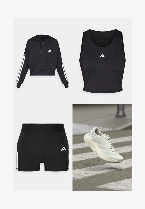 Čierna cropped mikina s kapucňou vyrobená z jemnej látky, s predným vreckom, zipsom a bielymi pruhmi pozdĺž rukávov a logom na hrudi.; Čierny športový crop top vyrobený z látky odvádzajúcej vlhkosť, s okrúhlym výstrihom, bez rukávov a bielym logom na hrudníku.; Čierne športové šortky vyrobené z elastického materiálu. Majú široký čierny pás s embosovaným logom a biele bočné pruhy.; Biela športová topánka vo vzduchu nad priechodom pre chodcov na sivej asfaltovej ulici s roztrúseným malým odpadom pod ňou.