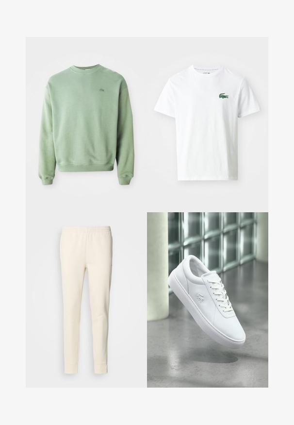 Hellgrüner Rundhalsausschnitt-Pullover mit langen Ärmeln und kleinem gesticktem Krokodil-Logo auf der linken Brust.; Lacoste T-Shirt print - white/green; Cremfarbene Sweatpants aus weichem Stoff, mit einem elastischen Taillenbund, schmal zulaufenden Beinen und Bündchen an den Knöcheln. Einfaches Design ohne Muster.; Weißer Sneaker mit niedrigem Schaft, Schnürdesign und eingeprägtem Krokodil-Logo, platziert auf einem grauen, polierten Boden vor einer Glassteinwand.