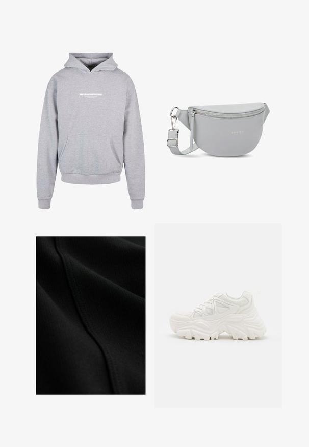 Sweatshirt à capuche gris avec une poche avant, arborant un texte imprimé en blanc "MÉTAMORPHOSE" sur la poitrine. Matière en mélange de coton, poignets côtelés.; Gros plan sur un tissu noir à fine texture côtelée avec une couture visible traversant en diagonale la surface.; Baskets blanches épaisses avec un dessus texturé, des panneaux en mesh et des semelles en caoutchouc épaisses avec un motif de semelle prominent. Lacets et tirette inclus.; Sac banane en cuir gris avec une forme arrondie, fermeture éclair et bandoulière réglable. Présente un logo de marque subtil embossé sur le devant.