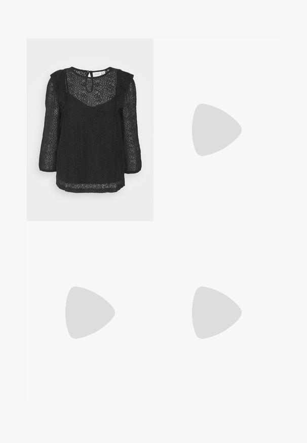 Top de encaje negro con mangas largas, que presenta un diseño texturizado, acentos en volantes a lo largo de los hombros y un escote redondo.; Falda negra con lunares, de cintura alta, cierre frontal con botones, hasta la rodilla, hecha de un tejido con una textura suave y un drapeado sutil.; Mules negros con tacón, de parte superior de cuero mate y suave, puntera abierta, banda ancha en el empeine y tacón cuadrado y delgado.; Pendientes de aro en tono dorado con una forma suave y redondeada y un acabado pulido. Presentan acentos naranjas en la parte trasera para un ajuste seguro.