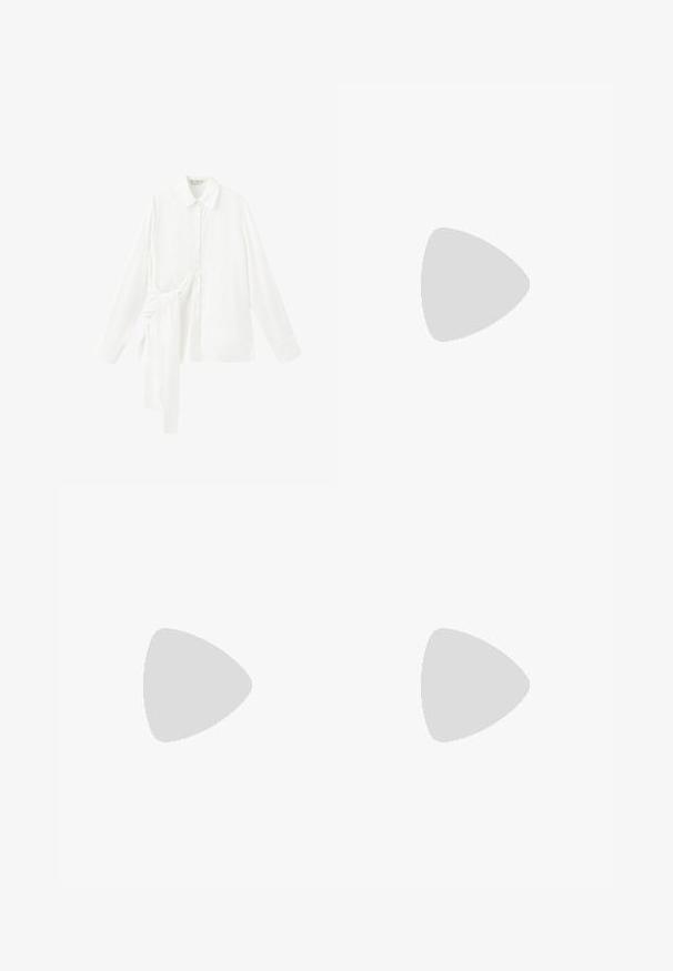 Chemise blanche à manches longues avec col pointu et détail de nouage asymétrique en tissu sur le côté gauche.; Pantalon noir à jambes larges avec passants de ceinture, bouton frontal et fermeture éclair, étalé à plat sur un fond blanc.; Racine à talon en cuir verni noir avec un nez pointu, des côtés découpés, une bride de cheville ajustable et un talon fin et élégant.; Sac à épaule en cuir noir brillant avec un seul compartiment zippé et une fine bandoulière arquée.
