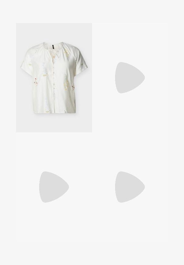 Blouse blanche à manches courtes avec broderie florale subtile, devant boutonné, encolure ronde et détail noué au col.; Pantalons larges bleu marine avec plis, fabriqués en tissu doux. Dotés d'une taille lisse et d'un design épuré pour un port polyvalent.; Baskets couleur crème en cuir texturé, accents marron clair et une bande gris clair. Elles comportent des lacets ronds et une semelle en caoutchouc.; Lunettes de soleil noires avec des verres gris dégradés, monture carrée surdimensionnée avec des détails dorés aux coins, et branches noires élégantes.