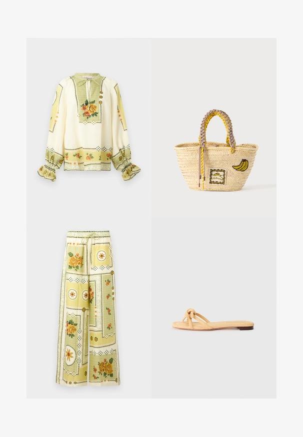 Crèmekleurige blouse met lange mouwen, geel-oranje bloemenprint, geplooide ruches aan de manchetten en een striknek met decoratieve knopen.; Wijde broek met lichtgele bloemen- en geometrische patchworkpatronen, met een elastische tailleband en trekkoord.; Geel geweven platte sandaal met twee kruislings geplaatste banden, een geknoopte detail aan de voorkant en een lage, bruine zool.; Geweven strooien tas met gevlochten gele en beige handvatten, versierd met een banaan patch en klein ingelijst visontwerp aan de voorkant.