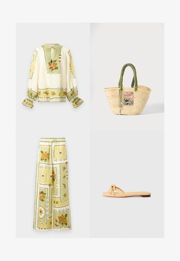 Crèmekleurige blouse met lange mouwen, geel-oranje bloemenprint, geplooide ruches aan de manchetten en een striknek met decoratieve knopen.; Wijde broek met lichtgele bloemen- en geometrische patchworkpatronen, met een elastische tailleband en trekkoord.; Geel geweven platte sandaal met twee kruislings geplaatste banden, een geknoopte detail aan de voorkant en een lage, bruine zool.; Geweven beige strooien tas met gevlochten groene en zwarte handvatten en een kleurrijke rechthoekige patch aan de voorkant.