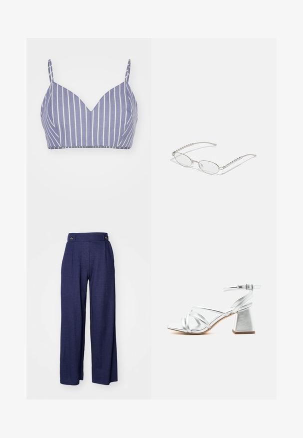 Bralette en coton violet clair avec des rayures blanches verticales, présentant un design en V et de fines bretelles réglables. Texture lisse, forme ajustée.; Pantalons larges bleu marine en tissu doux, dotés de plis et de deux boutons à l'avant de la taille pour un détail supplémentaire.; Sandale argentée à brides avec talon bloc et bride à boucle à la cheville, bout ouvert et semelle lisse sur fond blanc uni.; Lunettes ovales avec une monture métallique argentée, verres transparents et accents de branches texturées avec perles. Design léger avec des branches courbées.