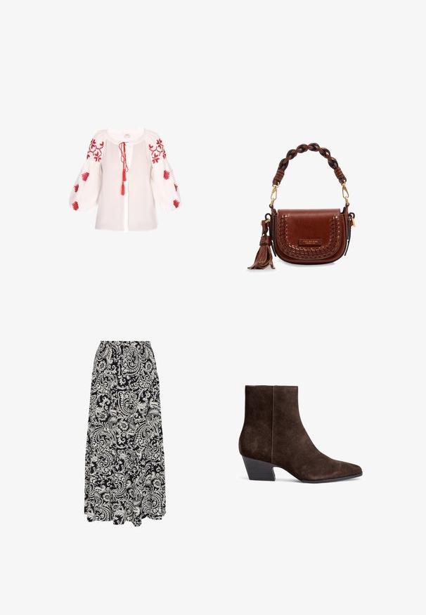 Blouse blanche avec broderie florale rouge sur les manches bouffantes, présentant une patte de boutonnage avec une fermeture à lien et des pampilles. Tissu doux et texturé.; Jupe longue à motif cachemire noir et blanc avec un design en étages et un tissu fluide.; Bottines en suede marron avec un bout pointu, un talon bloc moyen et un minimum de couture pour une apparence épurée.; Sac bandoulière en cuir marron avec anse tressée, détail pompon et plaque logo métal "The Bridge" sur le rabat avant.
