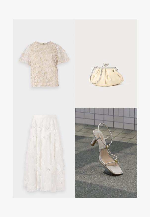 Beige bluse med blomsterbroderi, gennemsigtige puffærmer, rund halsudskæring og lynlåslukning i ryggen. Struktureret blomsterdesign på forpanelet.; Hvid, knælang nederdel med blomsterbroderi og sølvfarvede perler. Letvægts, flydende stof med rynkede lag og en tætsiddende talje.; Beige sandal med hæl og stropper, guldspænde og dekorativ guldkugle, på brostensbelagt underlag nær flisebelagt væg.; Plisseret beige læderclutch med en sølvmetalramme, der har to runde dekorative låse og en sølvkædetrasporte.