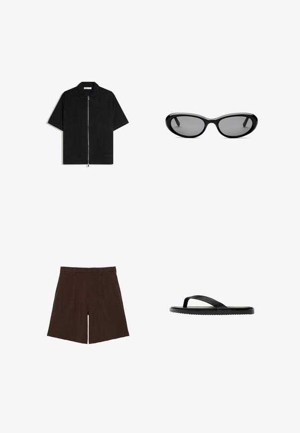 Chemise noire à manches courtes avec col et fermeture éclair argentée intégrale sur le devant, présentée à plat sur fond blanc.; Shorts marron foncé coupés au genou, cintrés avec passants de ceinture et plis sur le devant, présentés à plat sur fond blanc.; Sandale noire en caoutchouc avec semelle texturée et bride simple en forme de Y, montrée de profil sur fond blanc.; Lunettes de soleil ovales noires avec des verres teintés foncés et une épaisse monture brillante, montrées de face sur un fond blanc.