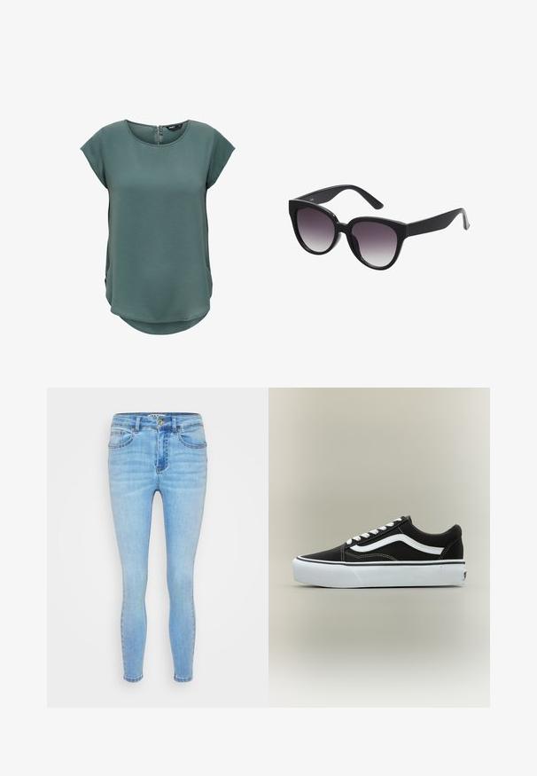 Haut vert à manches courtes en tissu texturé. Présente un col rond et une fermeture éclair discrète au dos, avec un ourlet légèrement arrondi.; Jean skinny bleu clair en denim, avec une fermeture à bouton et à zip, cinq poches, et une légère décoloration sur les cuisses et les genoux.; Baskets basses noires avec bande blanche latérale, lacets blancs, semelle en caoutchouc blanche et bout texturé sur fond neutre.; Lunettes de soleil noires en forme d'œil de chat avec des verres gris dégradés. Monture épaisse en plastique brillant et branches effilées. Aucune marque ou ornement visible.