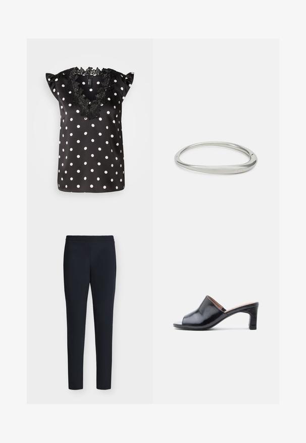 Blouse noire à pois blancs, avec des manches courtes à volants et un col en dentelle noire à bords festonnés. Matière en satin lisse.; Pantalon noir slim longueur cheville avec ceinture cousue et sans poches visibles, présenté sur un fond clair uni.; Mules en cuir noir à bout ouvert avec un design courbé, un petit talon carré et une texture lisse. Accents semblables au bois sur le talon.; Bracelet en métal argenté avec un design lisse et arrondi. Présente un profil mince et une gravure subtile de la marque "Calvin Klein" à l'intérieur.
