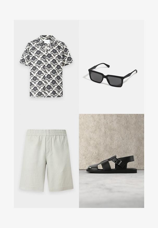 Korte mouwen shirt met een bloemenpatroon in zwart op een crèmekleurige achtergrond, met een kraag en een ontspannen pasvorm.; Lichtgrijze short gemaakt van gestructureerde stof, voorzien van een elastische tailleband en zijzakken; rechte pasvorm.; Zwarte leren sandaal met gespenband, open teen ontwerp, gepresenteerd op een beige tapijt met wazige bruine meubels op de achtergrond.; Zwarte zonnebril met rechthoekige lenzen, matte afwerking, dikke montuur en slanke veren met subtiele merkaanduiding.