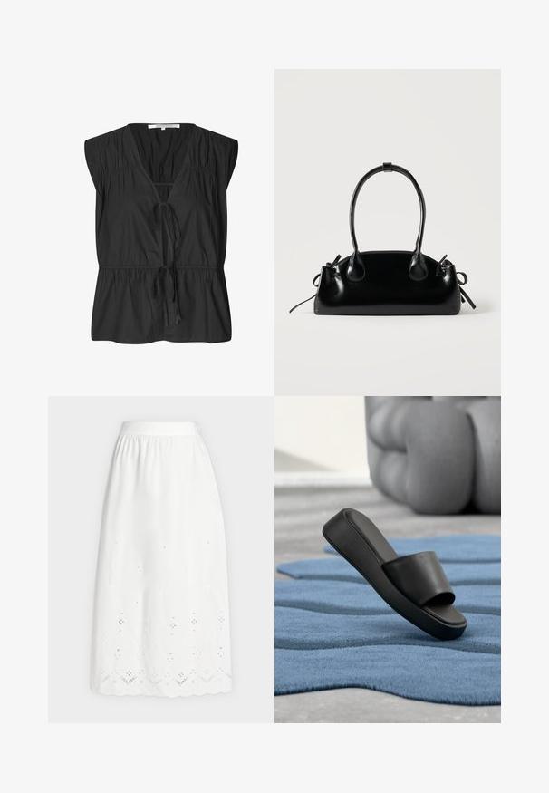 Second Female FELIXA - Bluse - black; Langer weißer Rock mit elastischem Bund, Ösenstickerei nahe dem welligen Saum und dezenten floralen Ausschnittmustern.; Schwarze Slide-Sandale liegt auf einer strukturierten blauen Matte mit großem grauem gepolstertem Möbel im Hintergrund.; Kleine schwarze glänzende Handtasche mit zwei langen Griffen und seitlichen Kordelzug-Details vor einfachem hellem Hintergrund.