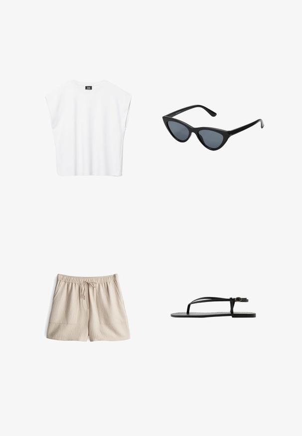 Weißes ärmelloses Crop-Top mit Rundhalsausschnitt, breiten Schultern und schwarzem "B6"-Etikett an der Innenseite des Kragens.; Beige Shorts mit elastischem Bund und Kordelzug, aus strukturiertem Stoff mit zwei Fronttaschen. Mittlere Oberschenkel-Länge.; Schwarze flache Sandale mit dünnen Doppelriemen, Knöchelriemen und T-Riemendesign auf schlichtem weißem Hintergrund.; Schwarze Cat-Eye-Sonnenbrille mit dunkelgrauen Gläsern, schlankem Kunststoffrahmen, spitzen Ecken und geraden Bügeln. Keine sichtbaren Befestigungen oder Akzente.