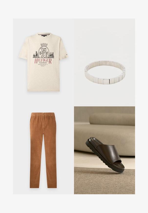 T-shirt beige à manches courtes avec un blason de lion noir, une silhouette de ville et un texte rouge "Hilfiger Club Sports Manhattan New York City" sur le devant.; Pantalons en velours côtelé marron avec une taille élastique, dotés d'une fermeture à bouton. Design à jambe droite et tissu doux et texturé.; Sandale slide en cuir marron foncé avec une semelle épaisse sur un tapis beige devant un canapé beige courbé.; Bracelet en argent composé de maillons métalliques rectangulaires avec une surface texturée et des bords lisses, arborant un branding subtil.