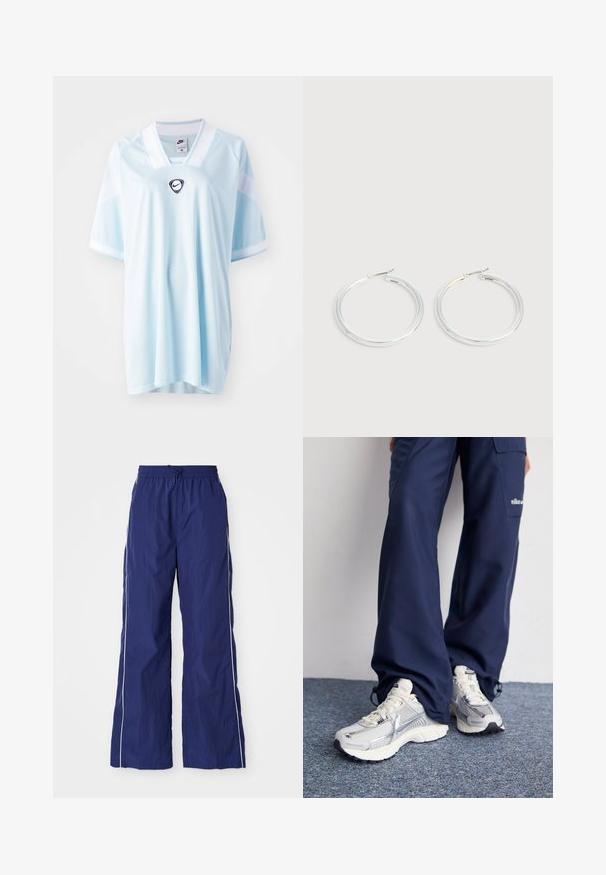 Gaiši zils Nike krekls ar V veida kaklu, īsām piedurknēm un melnu Nike logotipu centrā. Izgatavots no elpojoša, strukturēta auduma.; Jūras kara flotes zila, viegla, plata kāju bikses ar elastīgu jostu un auklu, ar baltām sānu svītrām un sakrunkātu tekstūru.; Nike sporta apavi ar sudraba sietu augšdaļu, baltām akcentiem un teksturētām zolēm, saskaņoti ar brīviem zila toņa biksēm.; Spīdīgu sudraba riņķu auskaru pāris ar plānām stieples aizdari, attēloti gaiši pelēkā fonā.