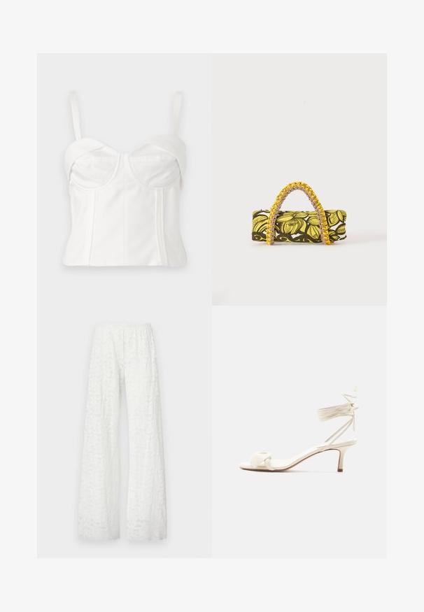 Bralette blanche courte avec bretelles réglables, tissu doux, corsage structuré, décolleté arrondi et coutures latérales pour la définition.; Pantalons larges blancs avec une taille élastique, présentant un motif floral en dentelle texturée sur l'ensemble du tissu.; Sandale à talon bas de couleur crème avec des liens à nouer autour de la cheville et une large bride torsadée sur les orteils, sur un fond blanc uni.; Sac rectangulaire avec motif floral jaune et noir et anse tressée jaune et rose sur fond blanc.