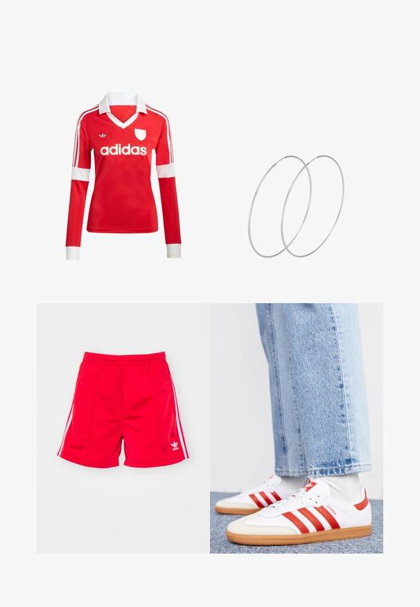 Rød langærmet fodboldtrøje med hvid krave og manchetter. Har tre hvide striber på skuldrene og "adidas" logoet fremtrædende vist.; Røde sports shorts med elastisk talje, der har hvide sideløbninger og et broderet logo nederst til venstre. Glat tekstur.; Hvide lædersneakers med røde striber og accenter. Har en tekstureret gummisål og polstret krave. Bæres med lyseblå denim.; Sølvøreringe med et minimalistisk design. Cirkulær form, glat tekstur og tynd profil. Letvægtige med en poleret overflade.