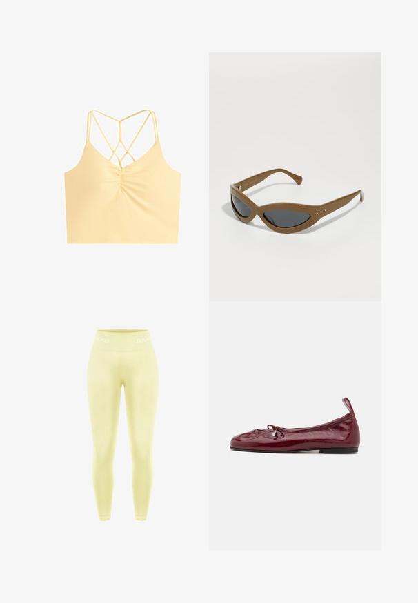 Crop top jaune clair avec devant froncé et fines bretelles spaghetti doubles formant un motif géométrique en croix dans le dos.; Leggings jaunes en matière douce, avec un design sans coutures et une large ceinture portant l'inscription "SMIM" en blanc.; Ballerines en cuir verni bordeaux avec un bout arrondi, semelle noire fine et un accent de nœud à l'avant. Texture lisse et brillante.; Lunettes de soleil en plastique marron avec une forme allongée en œil de chat, verres sombres et accents argentés en forme de point sur les côtés.