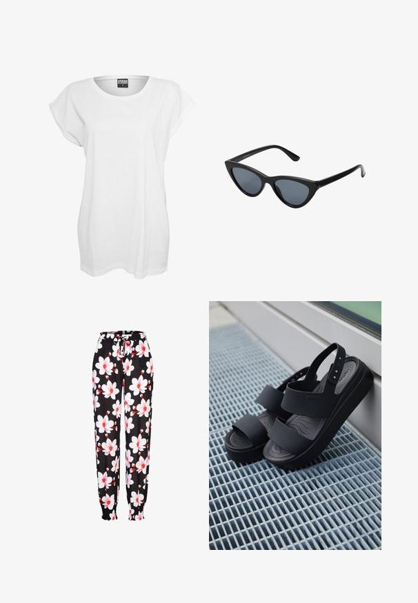 Hvid kortærmet t-shirt lavet af bomuld, med en afslappet pasform, bred halsudskæring og minimalistisk design uden mønstre eller accenter.; Sorte stofbukser med hvidt og rødt blomstermønster, elastisk talje med snøring og rummelige manchetter. Letvægtsmateriale.; Sorte platformsandaler med to brede remme og en bagrem, placeret på en metalristet overflade ved siden af et glasvindue.; Sorte katteøje solbriller med mørkegrå linser, slankt plastisk stel, spidse hjørner og lige stænger. Ingen synlig hardware eller dekorationer.