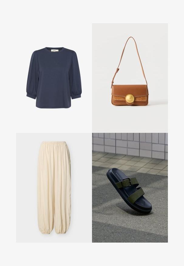 Navyblauw t-shirt met korte mouwen en een ronde halslijn, met pofmouwen en een ontspannen pasvorm. Zachte stof met een gladde textuur.; Losse, roomkleurige broek met een elastische tailleband en gerimpelde elastische boorden op een effen lichte achtergrond.; Zwarte slide-sandaal met twee olijfgroene bandjes en een zilveren gesp, rustend op grijze asfalt bij een betegelde stoepmuur.; Bruine leren schoudertas met verstelbare riem, witte stiksels, geperst patroon en grote ronde gouden gesp op de voorflap.